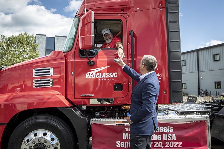 Spencer Webster hands keys for Mack Anthem to driver Steve Coleman