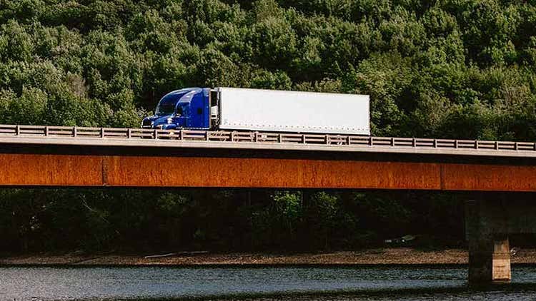 Blue color Mack Anthem on a bridge